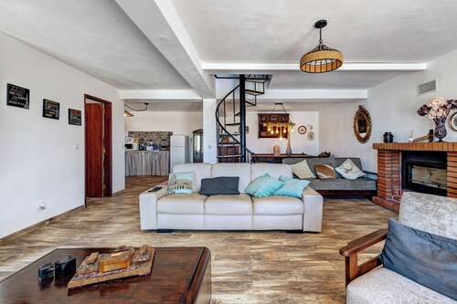 Holiday home 'Casa Girassol' with shared pool, private terrace, and Wi-Fi access