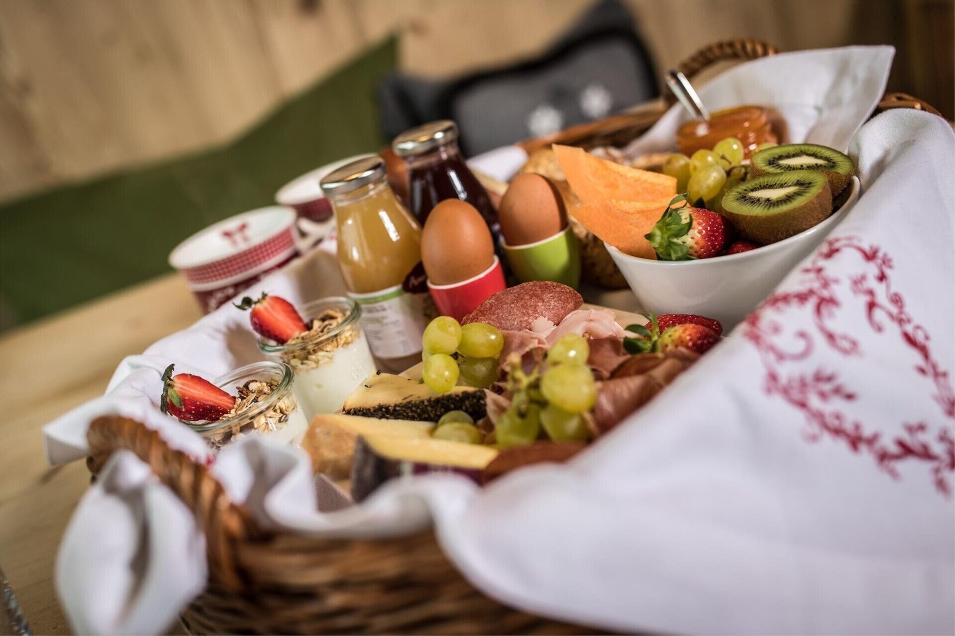 A breakfast buffet with various food items and condiments.