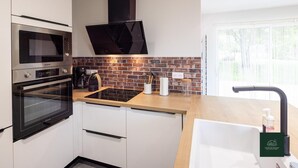 Microwave, dishwasher, high chair - L'Ecrin de Soligny - SOLIGNY LES ETANGS (SOLIGNY LES ETANGS)