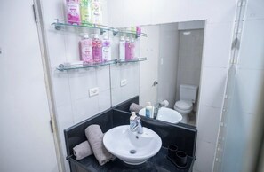 Shower, eco-friendly toiletries, hair dryer, bidet