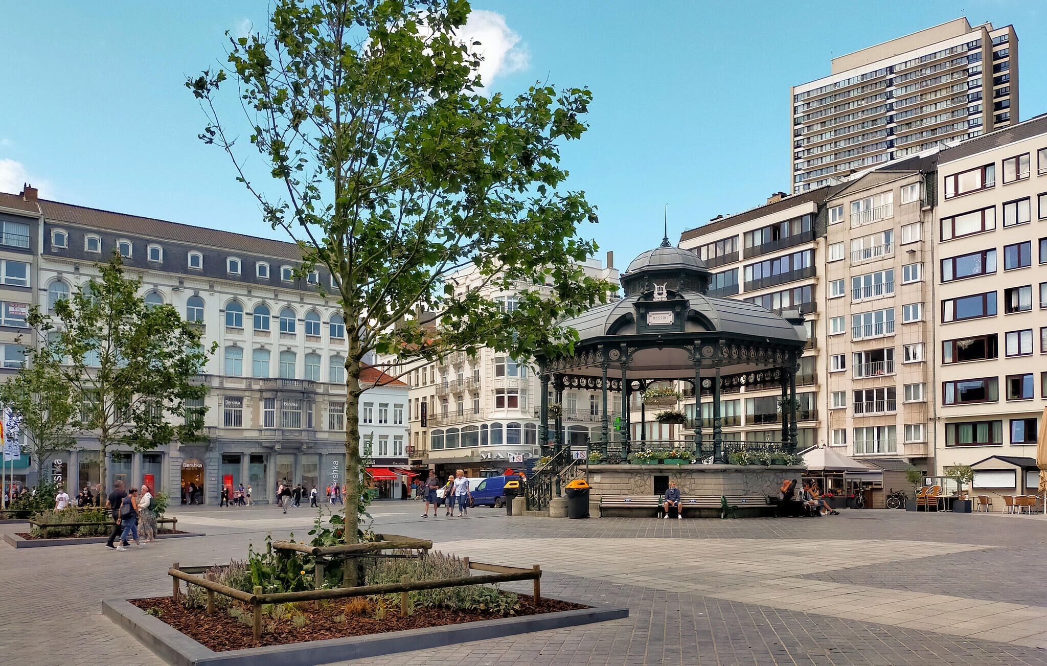 A public square with a gazebo, benches, and a fountain.