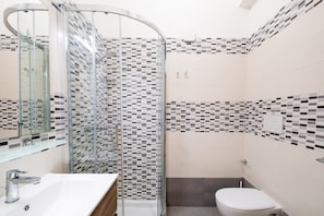 Regadera y secadora de cabello 