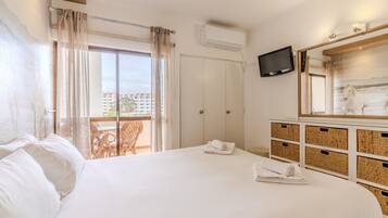 1 dormitorio, tabla de planchar con plancha, wifi gratis y ropa de cama