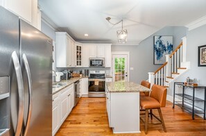 Fridge, microwave, oven, stovetop - Luxury South End Retreat w/ Hot Tub & 4 Bedrooms (Charlotte)