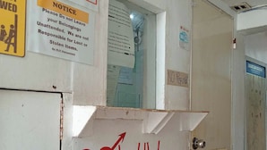 A door with a heart symbol and the name "WUVinn" on it, a sign stating "NO REFUND" and "STRICTLY NO REFUND NO CANCELATION POLICY", and a notice advising guests not to leave belongings unattended. - Wjv Inn Pusok (Lapu-Lapu)