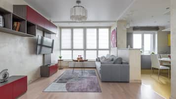 Comfort Apartment | Living area | 42-inch LCD TV with digital channels