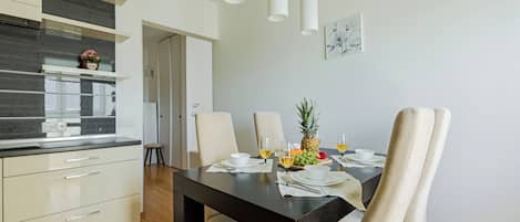 Comfort Apartment | Private kitchen | Full-sized fridge, microwave, oven, stovetop