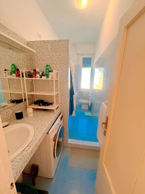 Hair dryer, towels, soap, shampoo