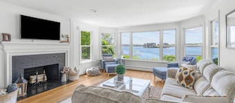 Stunning Waterfront Home with Hot Tub, Deck, Fire Pits, Office & More
