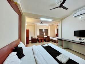 Deluxe Quadruple Room | Premium bedding, desk, laptop workspace, soundproofing - Hotel Subham Beach Inn - near Sea Beach (Puri)