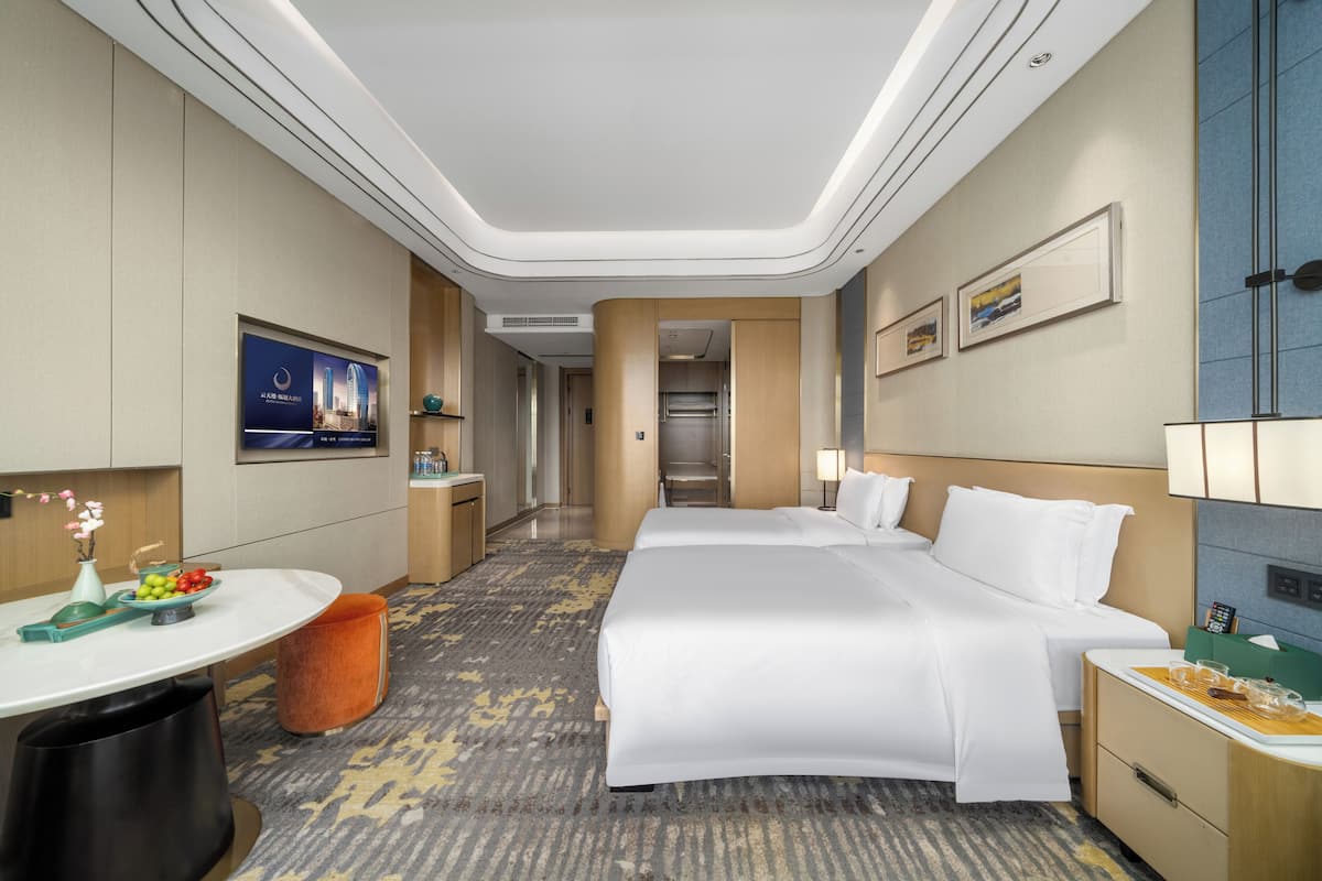 Eenvoudige Twin kamer | Een minibar, een bureau, gratis wifi, beddengoed