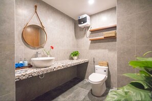 Hair dryer, towels, soap, shampoo