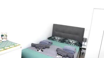 1 bedroom, desk, iron/ironing board, travel crib