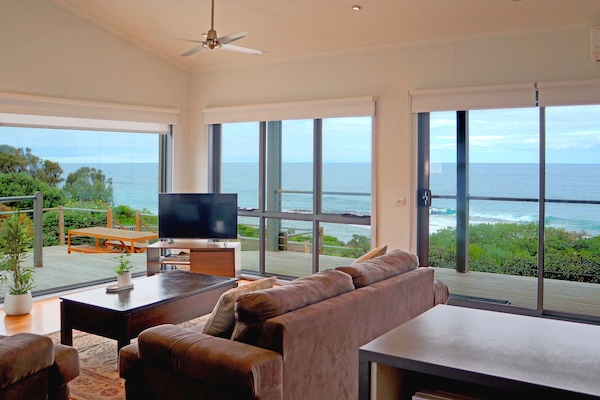 Relax and enjoy the panoramic view from the open living and kitchen areas.
