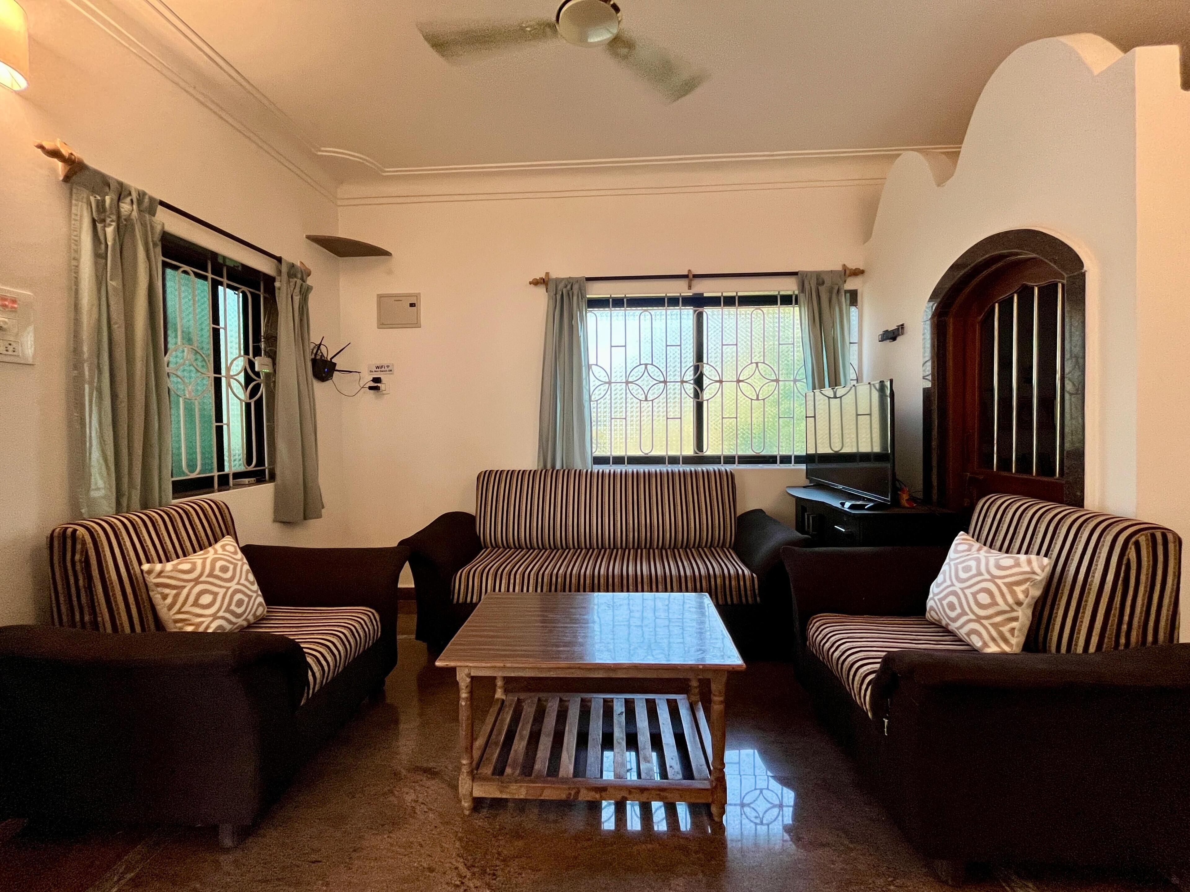 Comfort Apartment | Living area | 22-inch LCD TV with cable channels