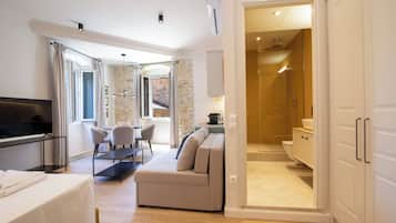 Superior Apartment | Living area | Flat-screen TV