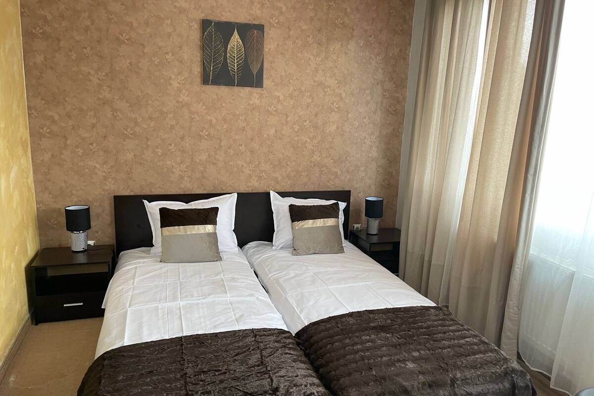 Comfort Room, City View | 1 bedroom, down comforters, iron/ironing board, WiFi (free)