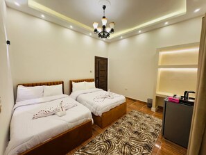Lakens van Egyptisch katoen, luxe beddengoed, een gratis minibar