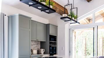 Coffee/tea maker, fridge, microwave, oven