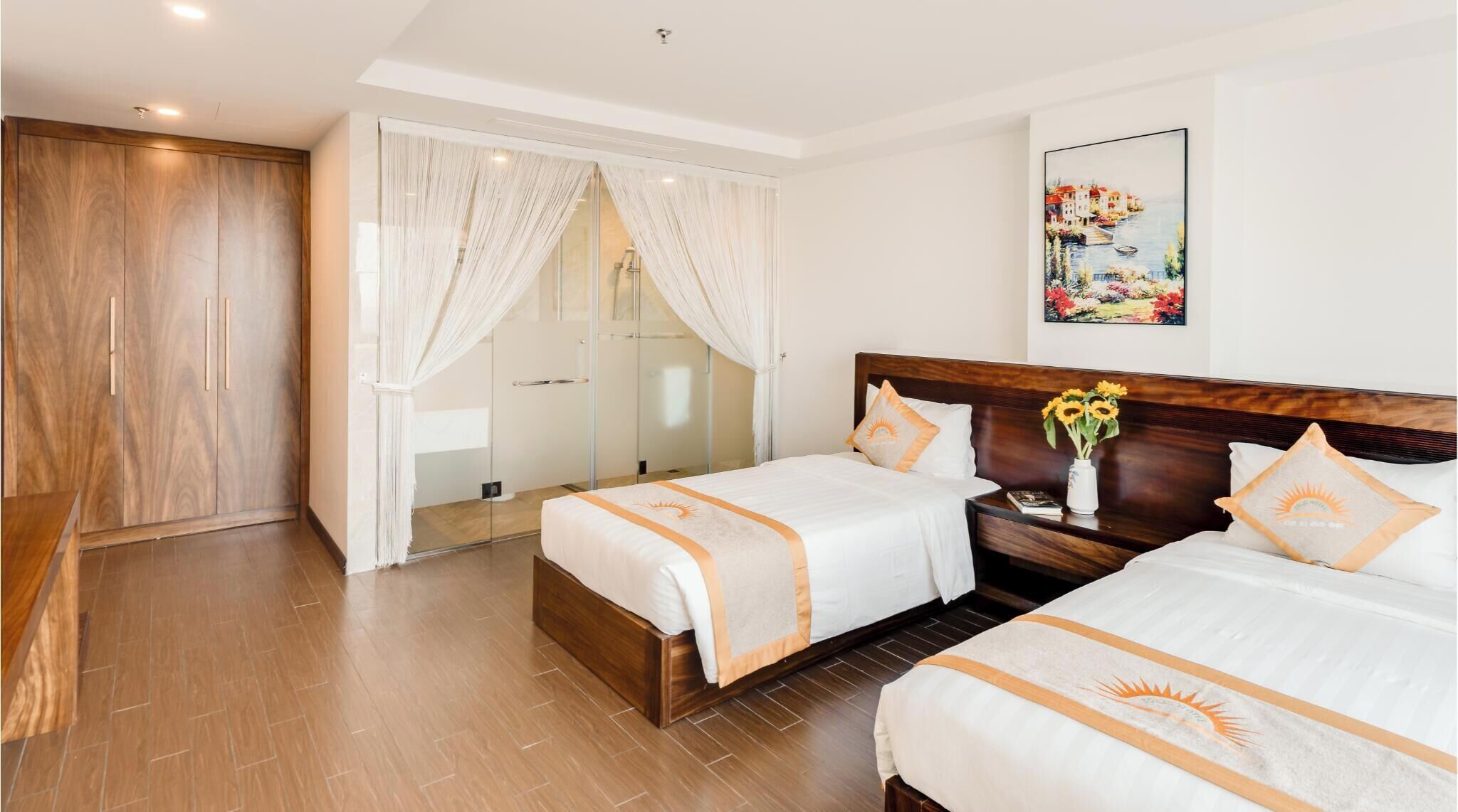 Down comforters, pillowtop beds, desk, laptop workspace