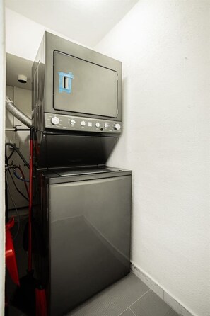In-Unit Laundry Amenities: Pack light and keep your wardrobe fresh throughout your stay using this convenient stacked washer and dryer, providing essential in-unit laundry convenience for long stays or family trips. - Iconic & Private 4BR: Walkable to Las Vegas Strip (Las Vegas)