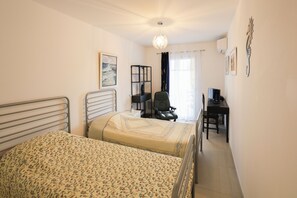 2 slaapkamers, een strijkplank/strijkijzer, gratis wifi, beddengoed