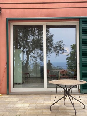 Outdoor dining - the silence among the olive trees, on a hill overlooking the sea (Imperia)