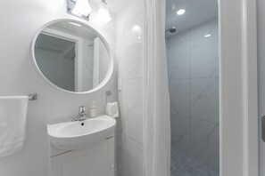 Hair dryer, towels, soap, shampoo