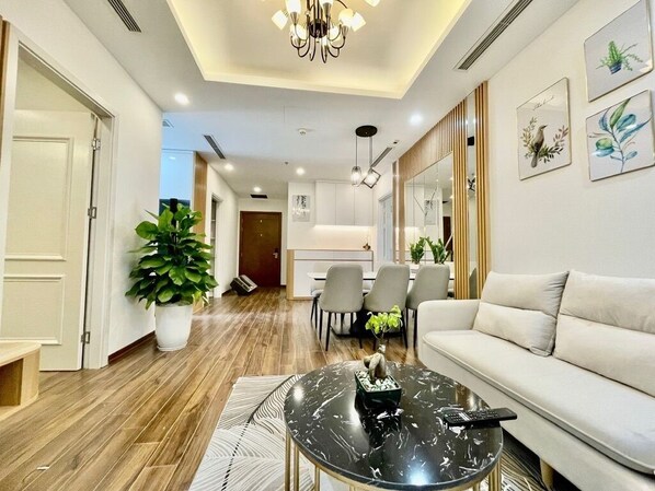 Deluxe appartement | Woonruimte | Een flatscreentelevisie