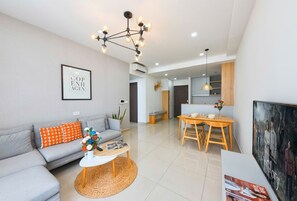 Deluxe appartement | Woonruimte | Een flatscreentelevisie