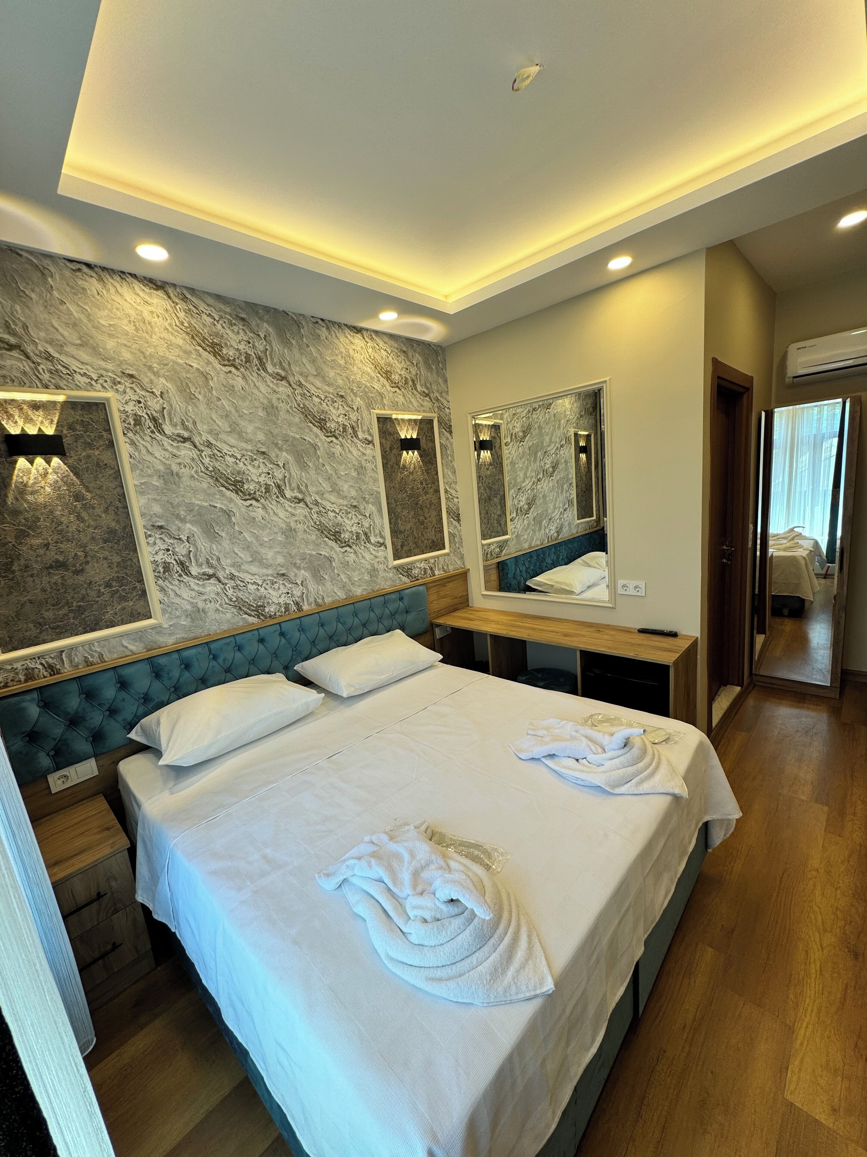 Egyptian cotton sheets, premium bedding, down duvets, minibar