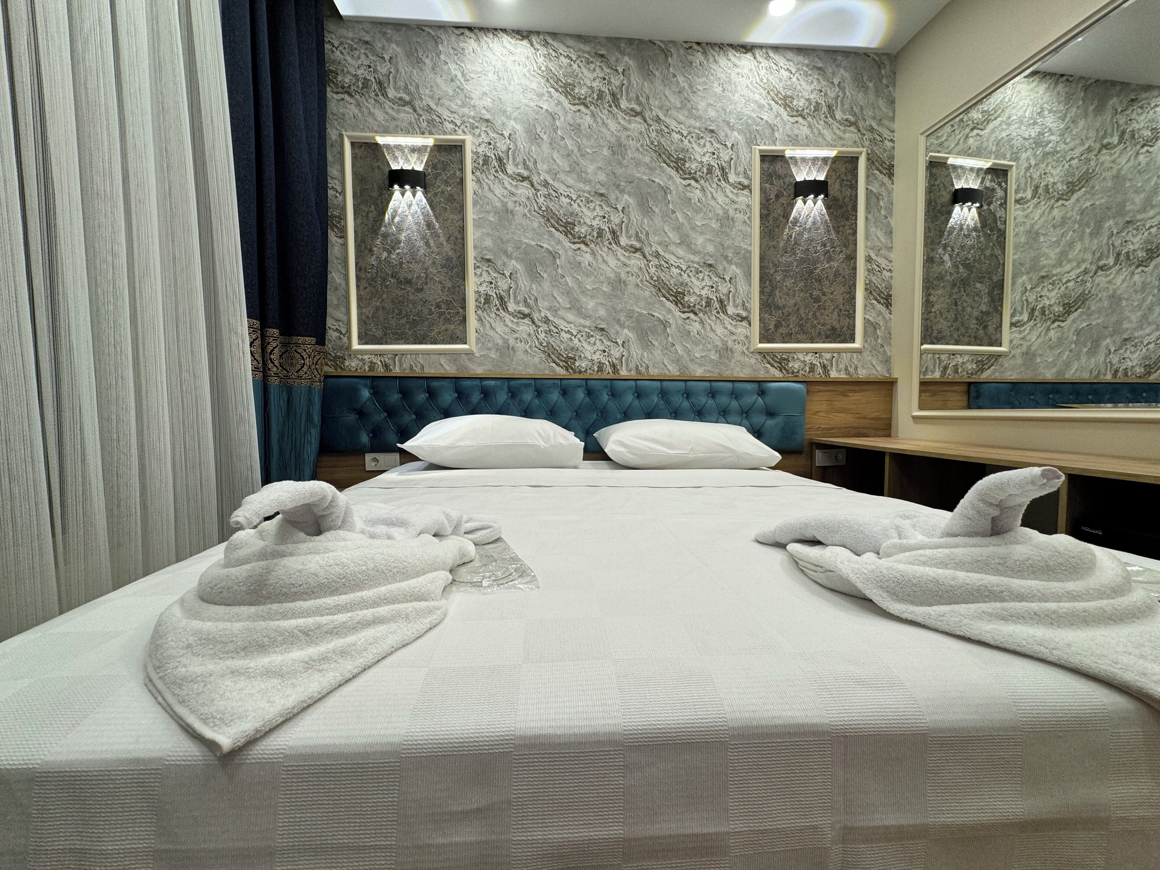 Egyptian cotton sheets, premium bedding, down comforters, minibar