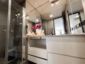 Shower, hair dryer, towels, soap