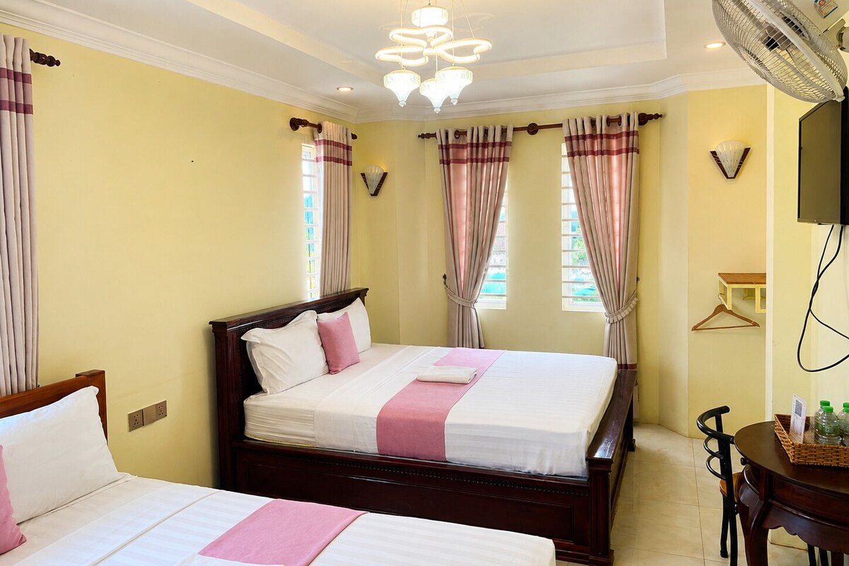 Economy Quadruple Room, Fan | Pillow-top beds, bed sheets