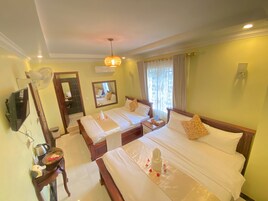 Family Quadruple Room, Air conditioning | Pillowtop beds, bed sheets