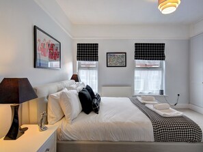 2 dormitorios, tabla de planchar con plancha, wifi gratis y ropa de cama