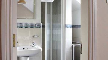 Shower, towels, toilet paper