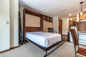 1 bedroom, desk, iron/ironing board, travel cot