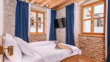 Family Apartment, Patio | Desk, soundproofing, iron/ironing board, free WiFi