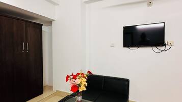 Habitación Premier | Escritorio, espacio para trabajar con laptop y insonorización