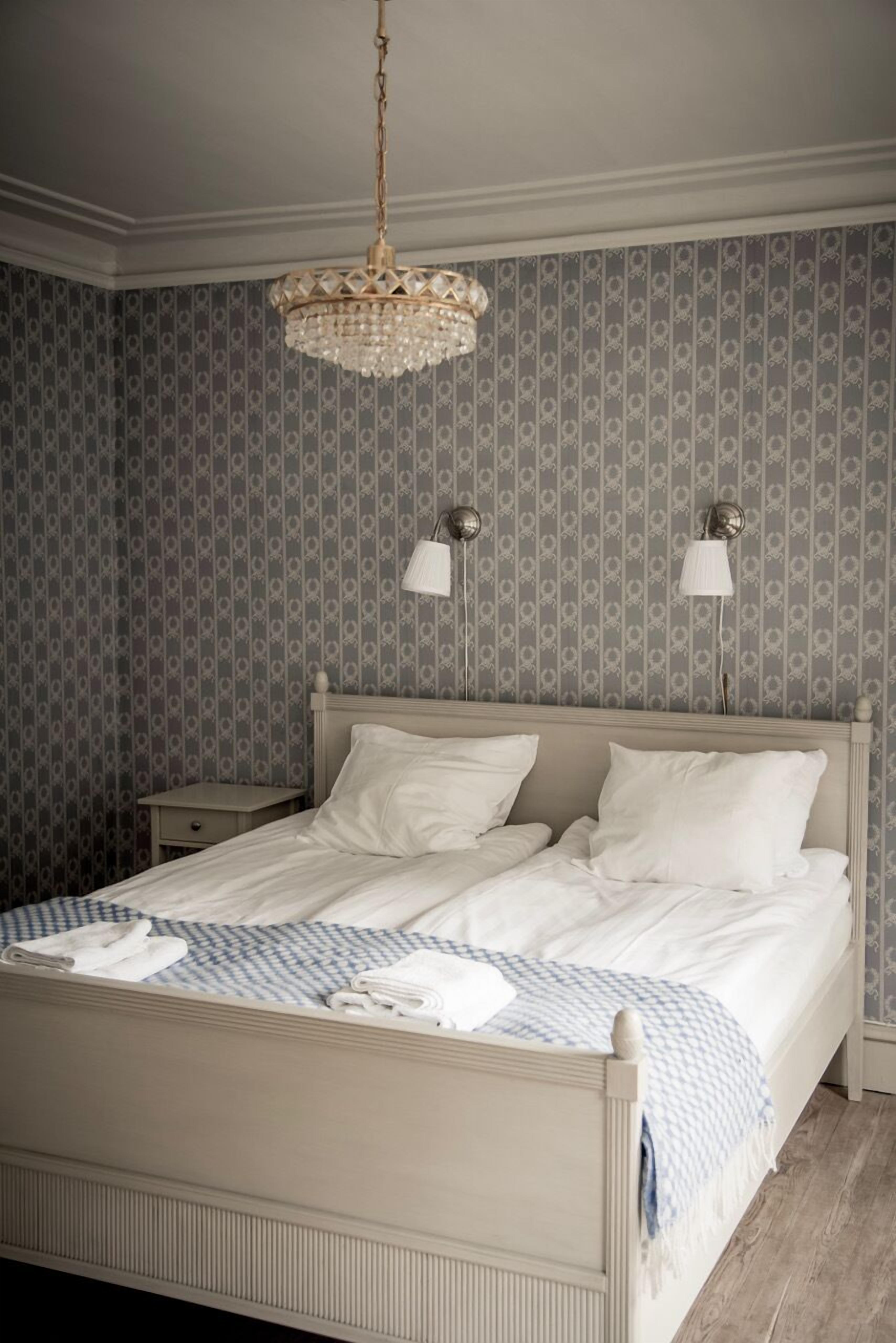 Habitación superior, vistas al jardín | Mobiliario individual, wifi gratis, ropa de cama