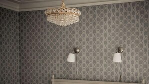A neatly made bed with a checkered bedspread, a hanging chandelier, and patterned wallpaper. - Ruders Egendom (Tibro)