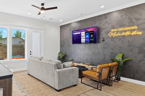 65 inch Roku Tv, 3 seater couch/pull out queen sofa bed, 2 accent chairs.