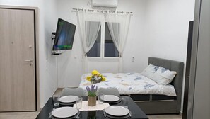 1 chambre, fer et planche à repasser, Wi-Fi, literie fournie