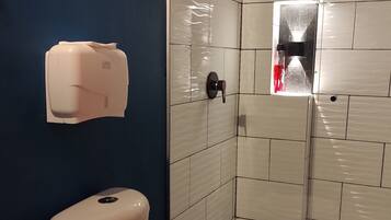Shower, rainfall showerhead, towels, soap