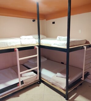 Economy Quadruple Room, Multiple Beds | Free WiFi, bed sheets - Casa Primavera Hostal (Medellín)