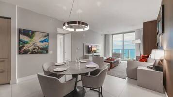 Family House, 2 Bedrooms, Beach View | Living area | 32-inch LED TV with cable channels