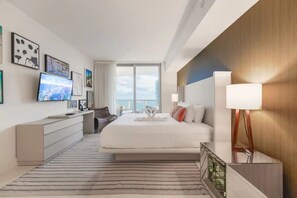 Familjehus - 2 sovrum - utsikt mot stranden | Värdeförvaringsskåp på rummet och strykjärn/strykbräda