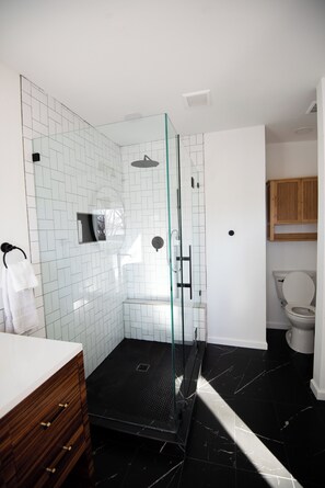 Shower, hair dryer, towels, soap