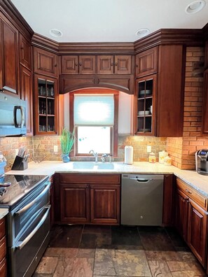 Fridge, microwave, oven, stovetop - 1800s Home Restored 5BR · Walk to UW & Downtown (Laramie)